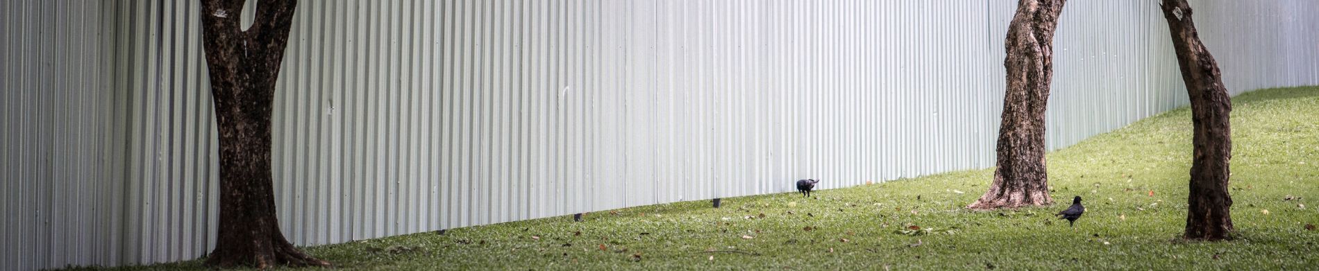 How Do You Install a Vinyl Fence on Sloping Ground Effectively?